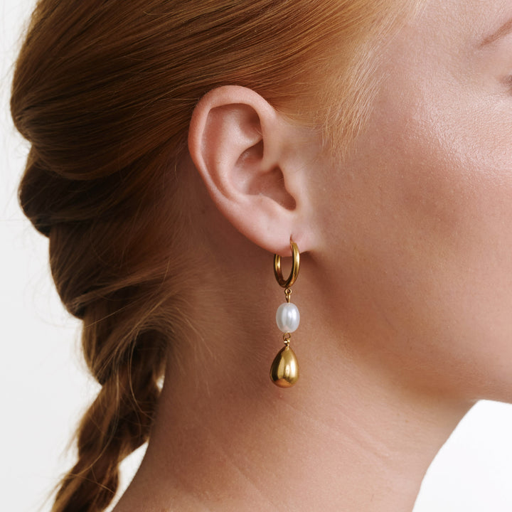 Laura - Boucles d'oreilles créoles en acier inoxydable avec perle